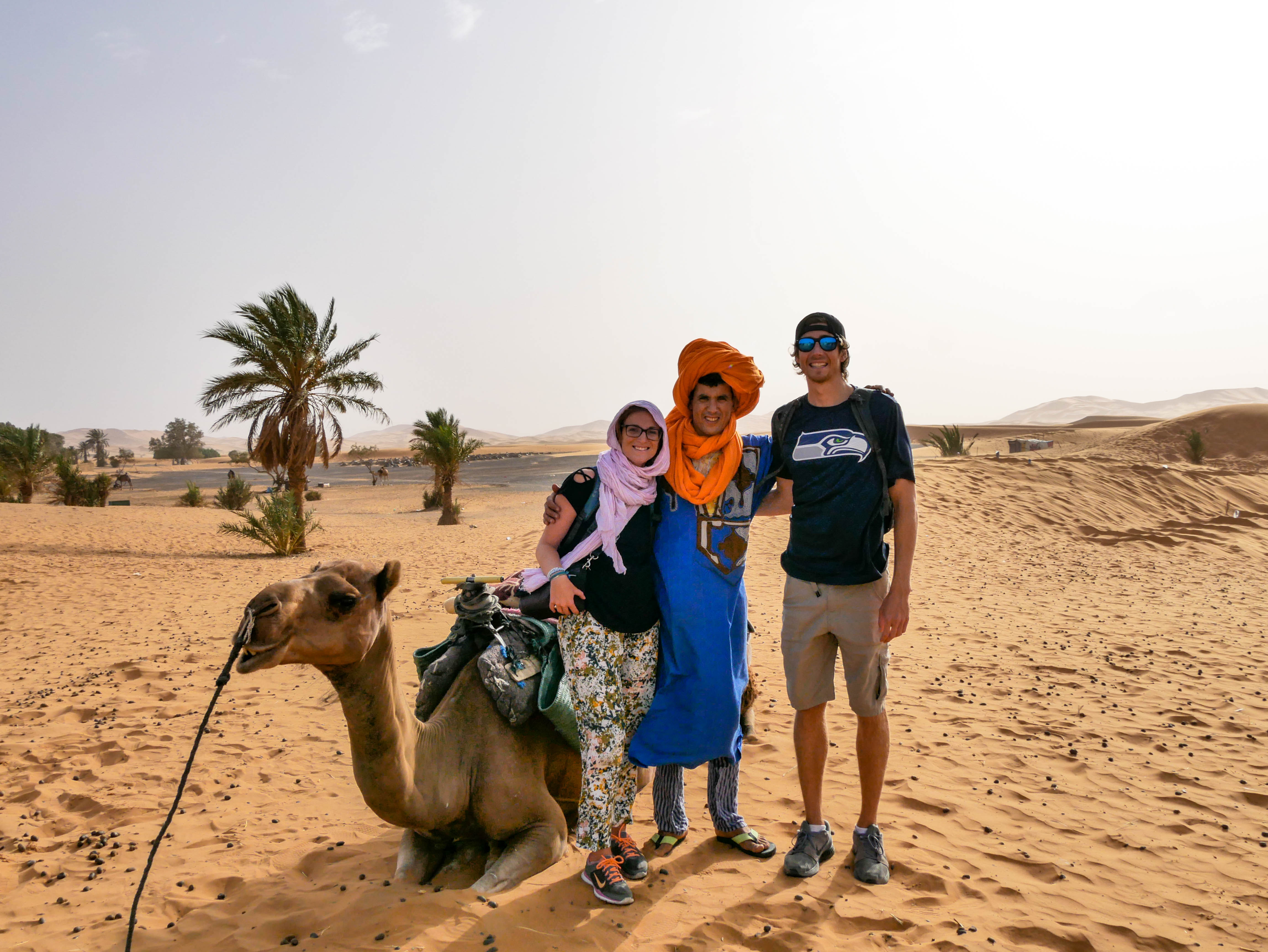 Travel couple with Morocco Camel Trekking guide Mohammed