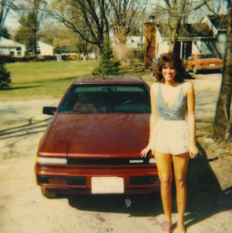 Mom in the late 1980's with her first car