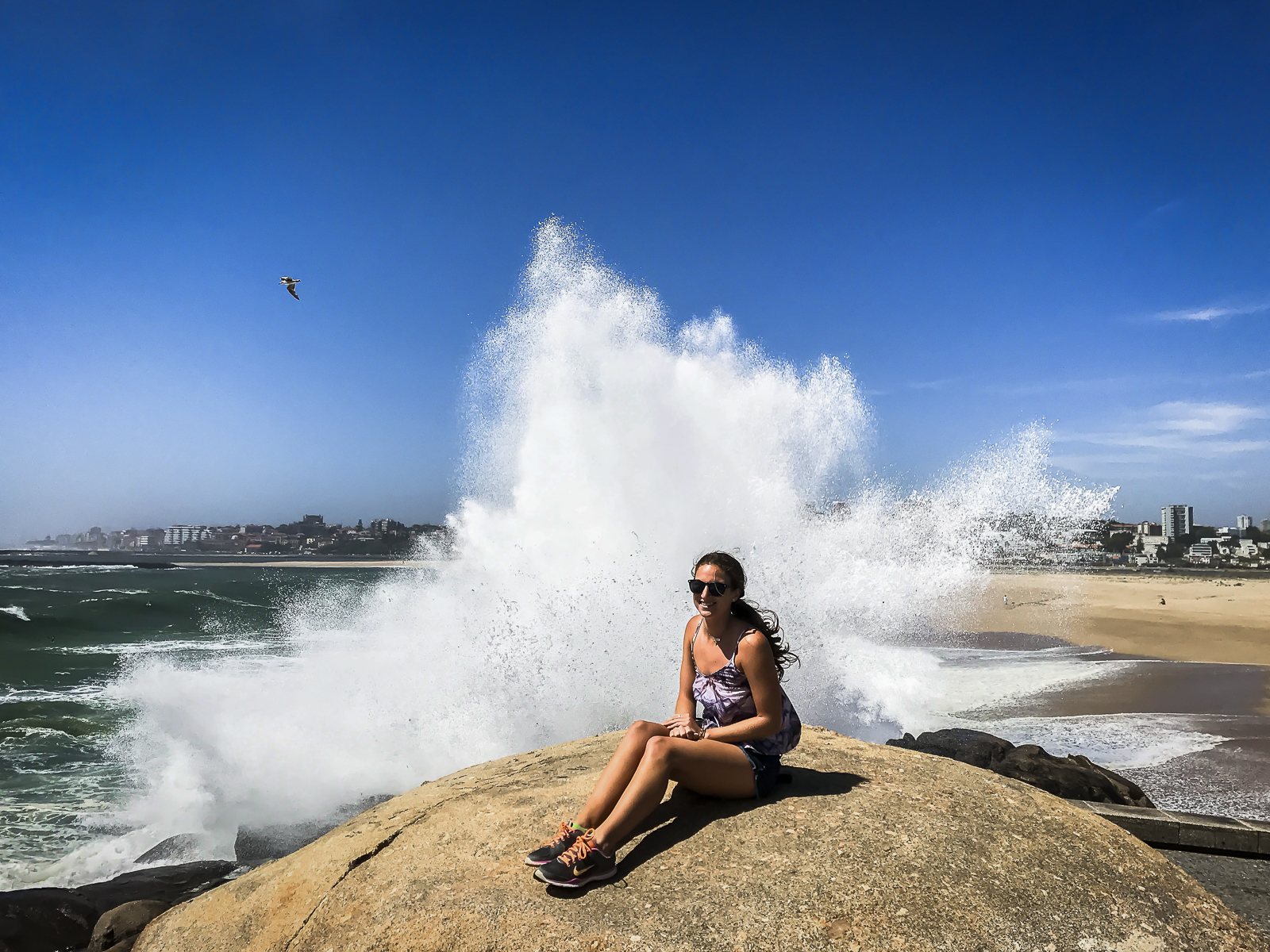 Shot on iPhone, big wave crashing on rock in Portugal