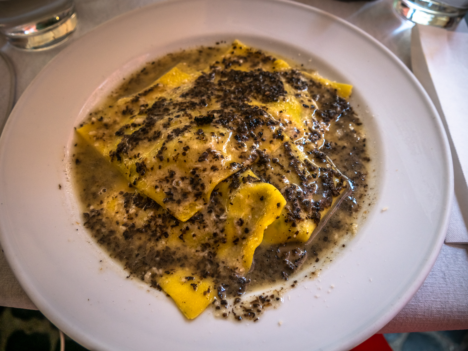 Ricotta Spinach Ravioli Truffle Sauce. Rome. Italian Food. go4theglobe.jpg